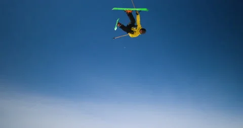 Reveal Shot Of Someone Doing Tricks While Skiing Stock Footage 139454953