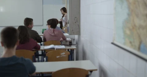 Reveal Shot Students Walking Into Classroom Stock Footage 126985167
