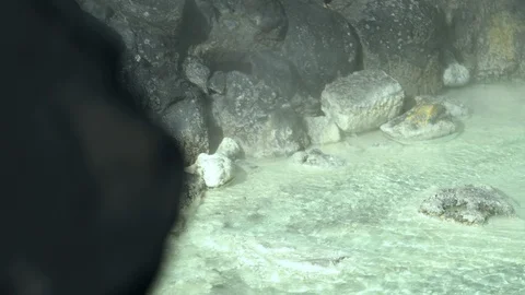 Reveal of the source of Kusatsu Onsen spring bubbling up from underground Stock-Footage 101503172