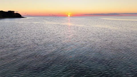 Reveal of sunset from the sea Stock-Footage 342731451
