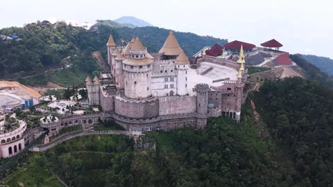 Revealing aerial drone view of Ba Na Hills SunWorld castle in Vietnam Stock Footage 340029882