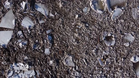 A revealing aerial view of a close-up of pack ice going down the river Stock Footage 149819261