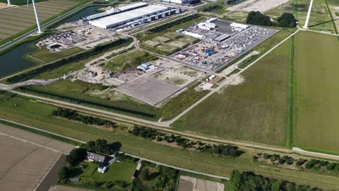 Revealing Aerial View of Large Data Center Expansion in Eemshaven Stock Footage 325834400
