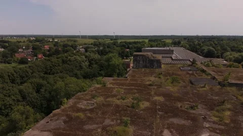 Revealing damaged Structure Bunker Valentin Denkmal Drone 4K 動画素材 334232515