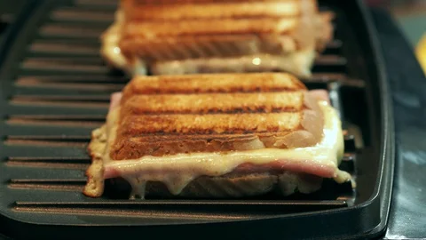 Revealing delicious grilled ham and cheese sandwich Stock Footage