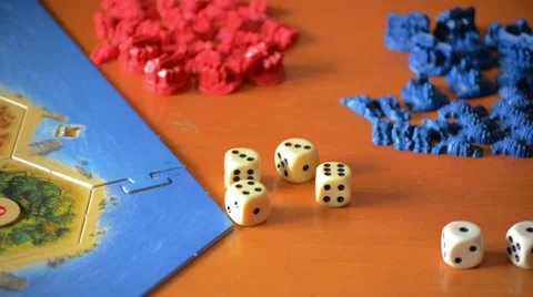 Revealing dice during board game Stock Footage 37798762