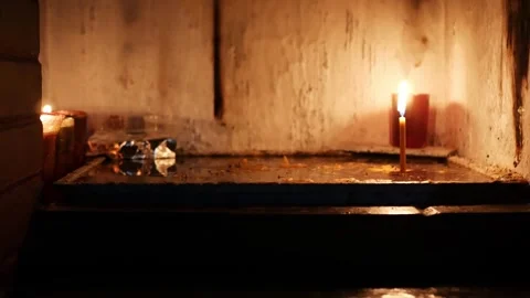 Revealing lighted candles in tiny hermitage Stock Footage 291866489