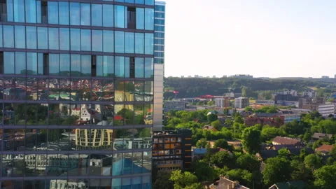 Revealing Shot Of Architectural Skyscraper Of Arfa Building In New City Of Stock Footage 156007046