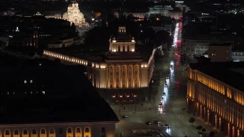 Revealing Sofia’s Illuminated Central Road with Traffic and Alexander Nevsky Stock Footage 321896099