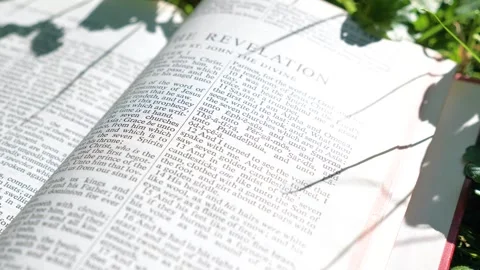 The Revelation of St John the Divine chapter of Holy Bible book Stock Footage 300939736