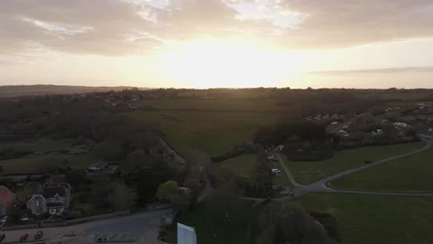 Reverse aerial drone flight over St Helens Duver beach at sunset Vídeos de archivo 333333901