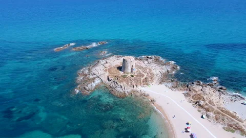 Reverse Aerial Drone Flyaway of Torre di Bari Sardo Beach – Sardinia Stock Footage 313548858
