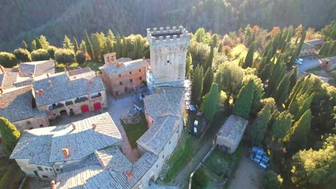 Reverse aerial drone reveal view Gargonza Castle Tuscany Italy 스톡 동영상 168540565