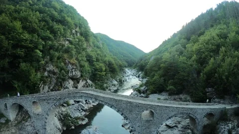 Reverse Aerial Flight Over Arda Gorge and Above the Devil’s Bridge Stock Footage 321372730