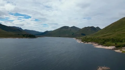 Reverse Aerial Flight Over Loch Cluanie, Scottish Highlands - Natural Scenery Stock Footage 262015729