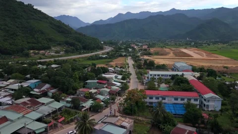 Reverse Aerial Flight Over Rural Mountain Village in Central Vietnam Video stock 339140955