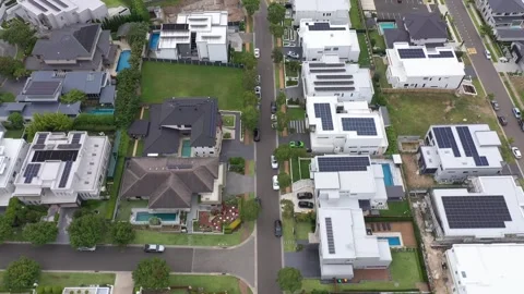 Reverse aerial flyover of modern prestige homes, Sydney, Australia 動画素材 264699744