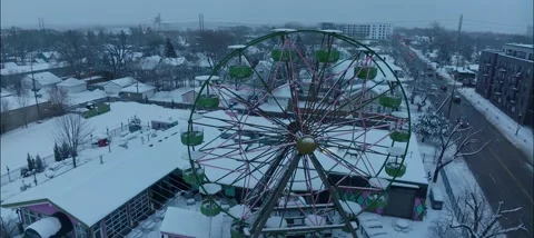 Reverse Aerial Of Snow Covered Ferris Wheel At Betty Danger's NE Minneapolis MN Stock Footage 230563346