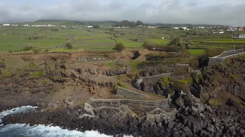 Reverse Aerial Of Stunning Green Patchwork Fields On Atlantic Coastline, Azores Video stock 90626139