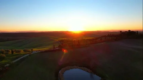 Reverse Castle Gallico sunset Aerial drone view Tuscany Italy Siena Stock Footage 168569893