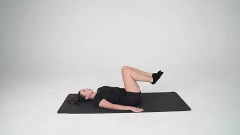 Reverse crunches (bent knees) Stock Footage 314194365