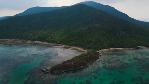 Reverse dolly aerial view of Annora Beach, Karimunjawa, Central Java, Stock Footage 281103159