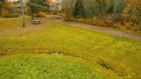 Reverse Drone Flight Low Over The Ground And Past Natural Stairs Video stock 255059382