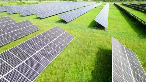 Reverse Drone Flyby Revealing Solar Panels – Cinematic Low Pass Aerial Motion 動画素材 337703272