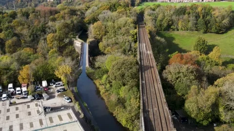 Reverse Drone Footage Of Railway Line And Canal Aquaduct 2, 4K 動画素材 220087147