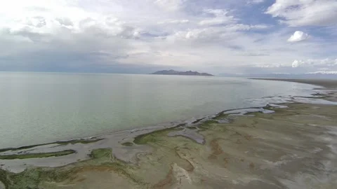 Reverse drone pan shot Great Salt Lake Utah USA Stock Footage 253727997