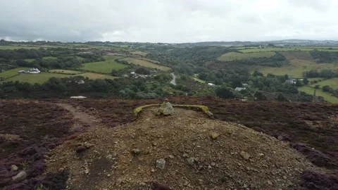 Reverse flight away from a beacon on old mining ground Video stock 169885147
