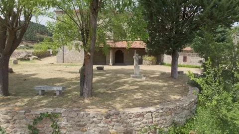 Reverse flight with a drone outside a medieval sanctuary Vídeos de archivo 293215825