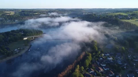 Reverse flight over a beautiful misty landscape 스톡 동영상 203651369