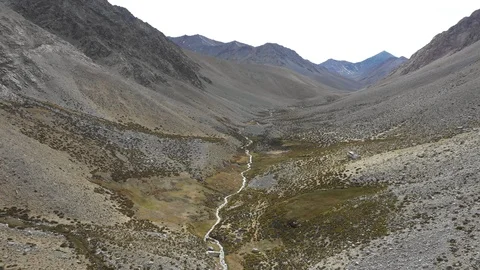Reverse flight view in Andes Mountains scenery an awe rugged landscape Vídeos de archivo 125448187