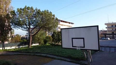 Reverse fly over an old basketball board Stock Footage 121322032