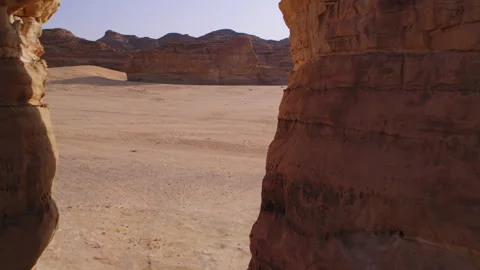 Reverse fly through Elephant Rock, Al Ula, Saudi Arabia. Morning, 4K. Stock Footage 196810781