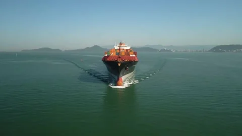 Reverse Following a big vessel/cargo ship in the open ocean 4k 60fps Stock Footage 225434855