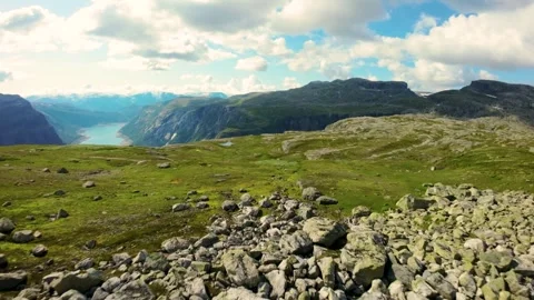 Reverse FPV Drone Flight: Soaring Backwards Up the Mountain Stock Footage 282398312