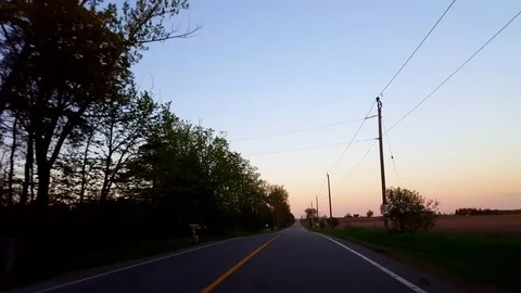 *Reverse Motion* Driving Rural Countryside Road During Sunset Stock Footage 127247003