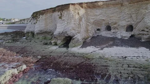 Reverse pan angle drone shot of natural beautiful rock cliff formation Stock Footage 167770456