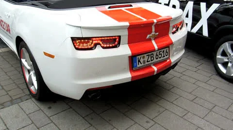 Reverse parallel parking american muscle car with funny tail light Video stock 25433347