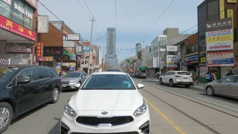 Reverse POV driving urban downtown Toronto city streets with car traffic Stock-Footage 151856533