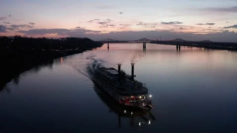 Reverse pullback aerial shot of the American Queen river cruise ship Stock Footage 202243034