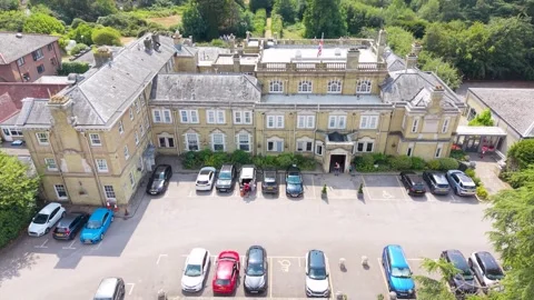 Reverse Rising Aerial Shot Pulling Away From Chilworth Manor Stock-Footage 340603741