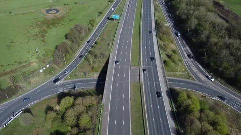 Reverse shot E to W M65 Motorway Junction 8 Altham, Lancashire. UK. 10-04-2026 Stock Footage 332717457