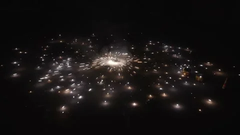 Reverse shot of Ground Spinner fireworks during the Diwali festival in Stock Footage 165253316