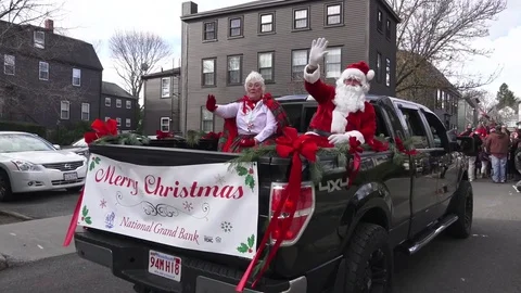 Reverse Shot Santa and Mrs Claus Christmas Parade Stock Footage 70335869