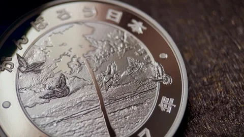 Reverse Side of Japanese 1000 Yen Silver Commemorative Coin Macro Video Stock Footage 346241707