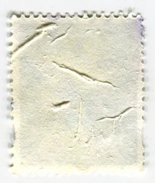 The reverse side of a postage stamp. Stock Photos