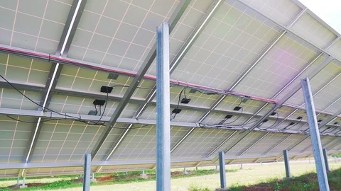 Reverse side of solar panels in a power plant Video stock 129403988